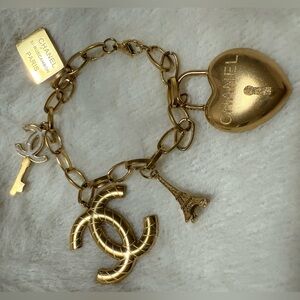 Stunning Goldtone Bracelet With CC Charms
